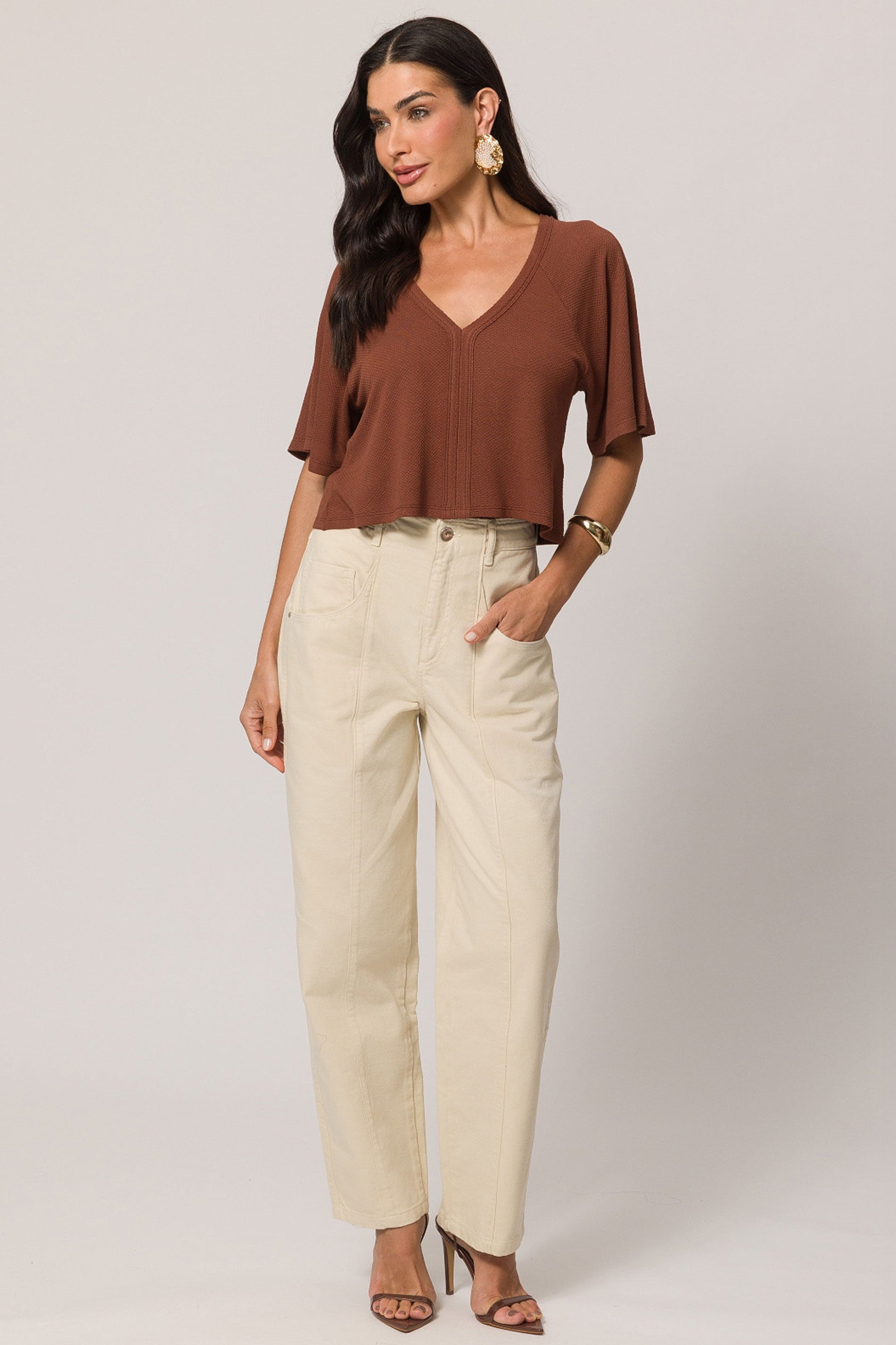 Blusa solta de manga curta em malha new favo