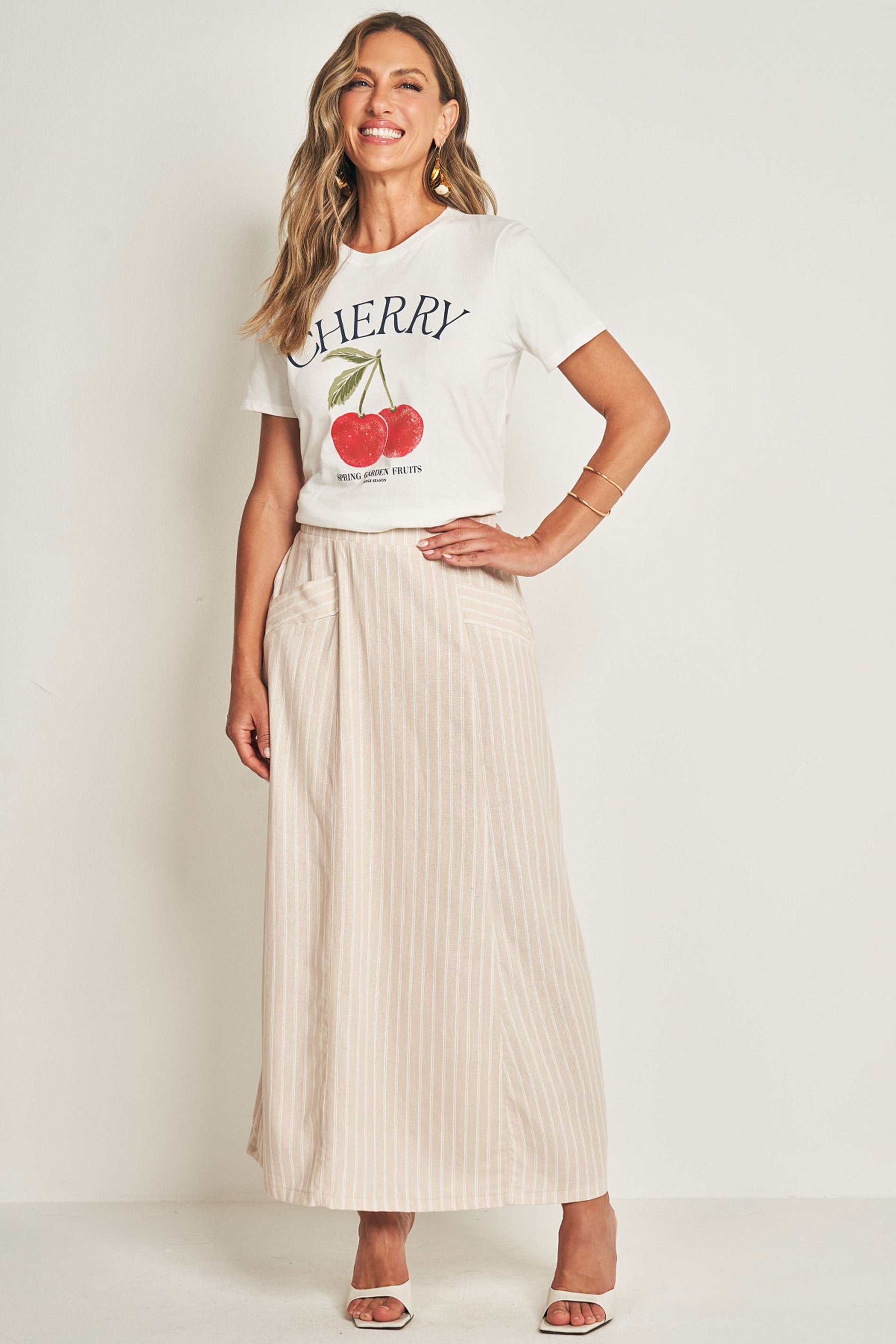 Saia longa em plano linen com listras