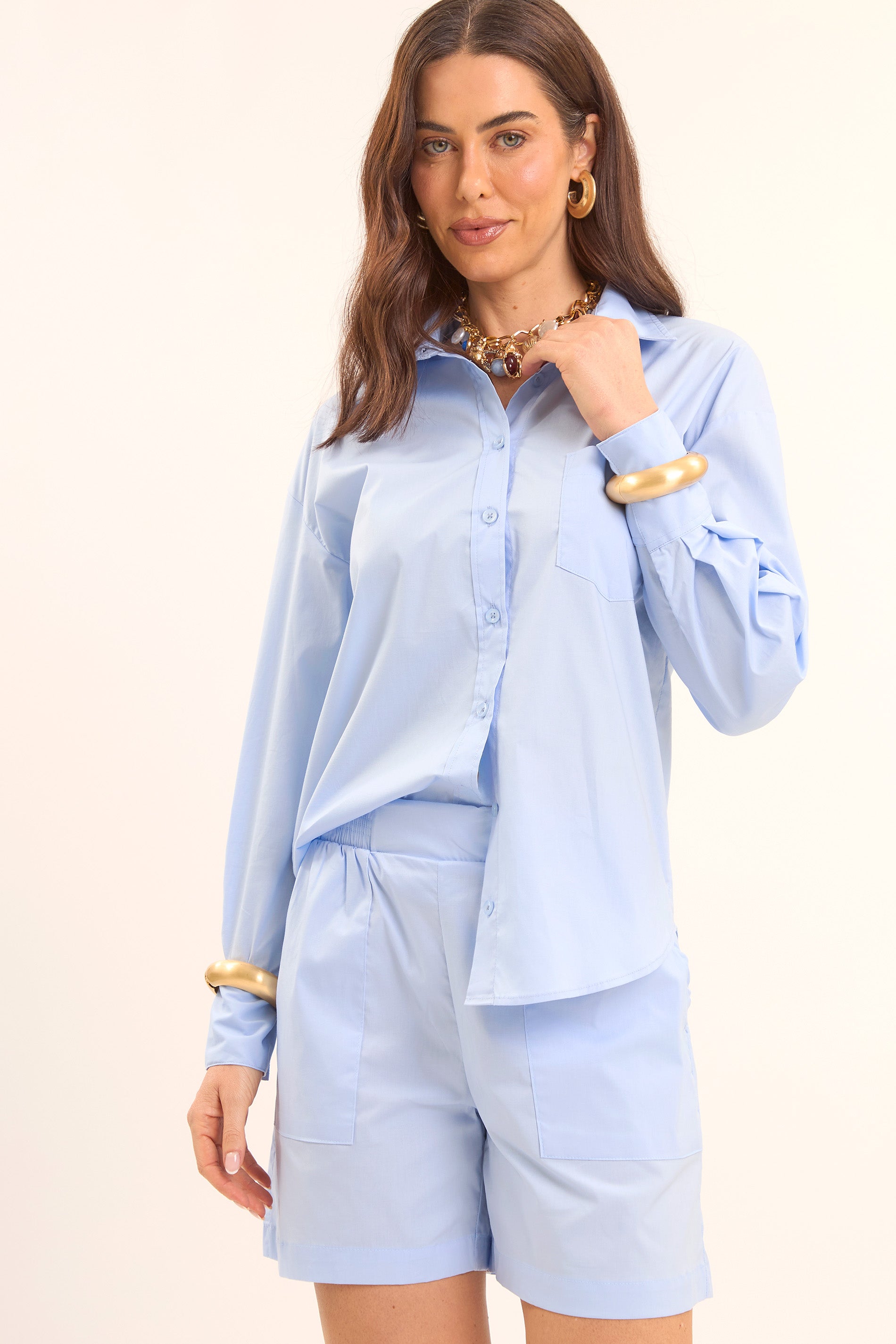 Camisa com Bolso Frontal e Mangas Longas